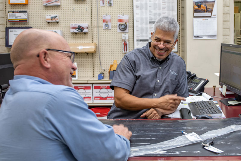 Parts Department Employee with customer