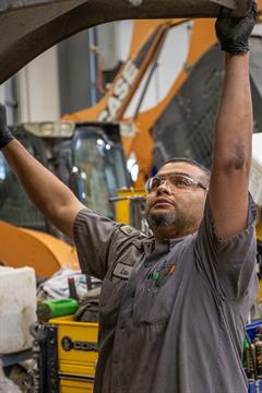 Technician Performing Uptime Inspection Titan technician performing a construction Uptime inspection