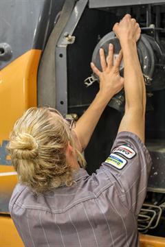 Uptime CE_Service Technician Female Service Technician doing a construction Uptime Inspection