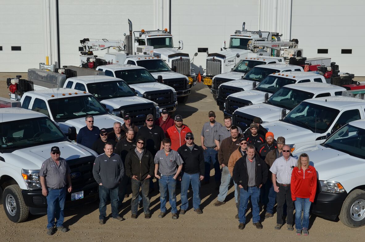 About Us Page Titan Machinery Service Team with Service Vehicles
